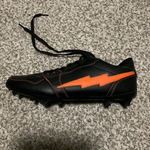 Travis Scott Black and Orange Athletic Shoes